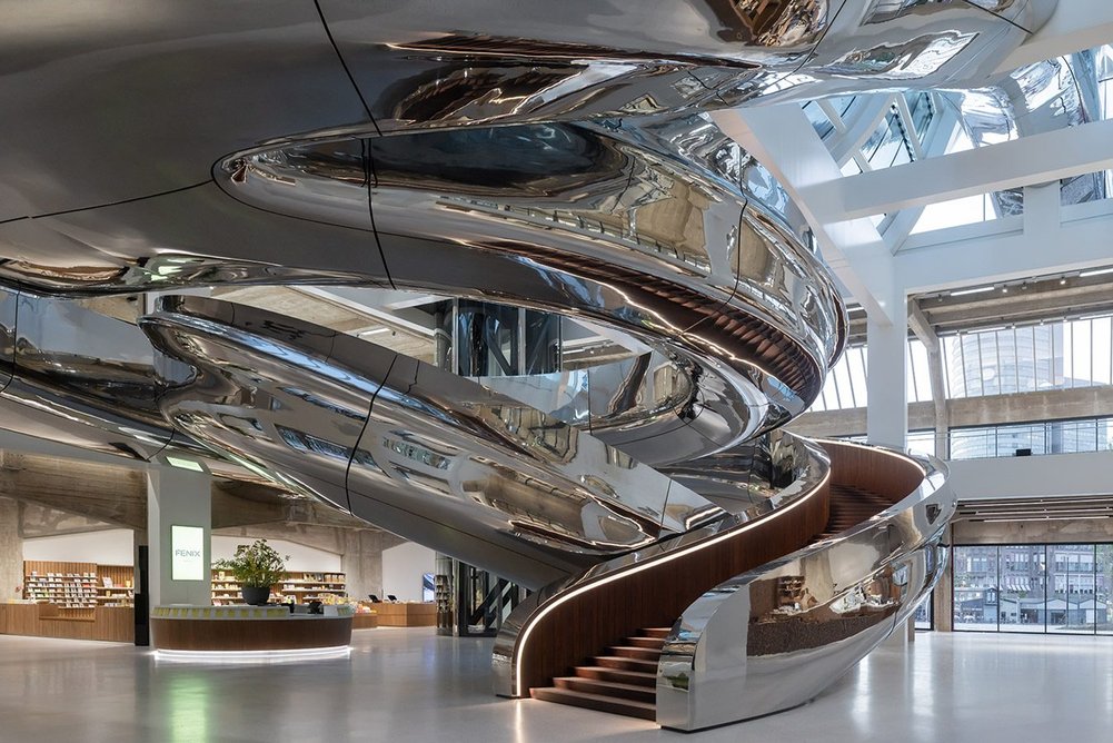 The Tornado is clad in 297 stainless-steel panels and uses 12,500 oiled wooden planks.