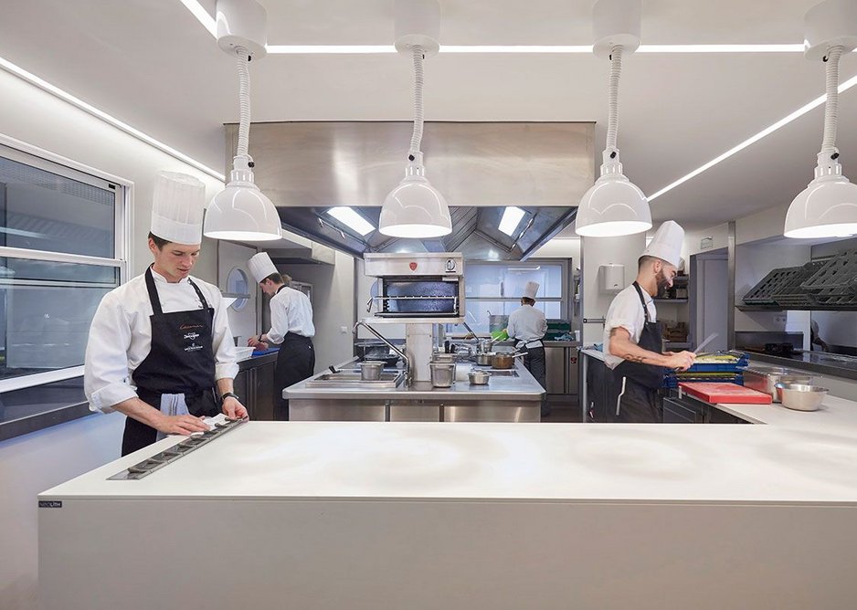 Perfect form and function: Neolith Nieve sintered stone walls and worktops at Hotel Casamar.