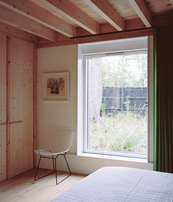 The ground floor main bedroom with its view of the protected sycamore.