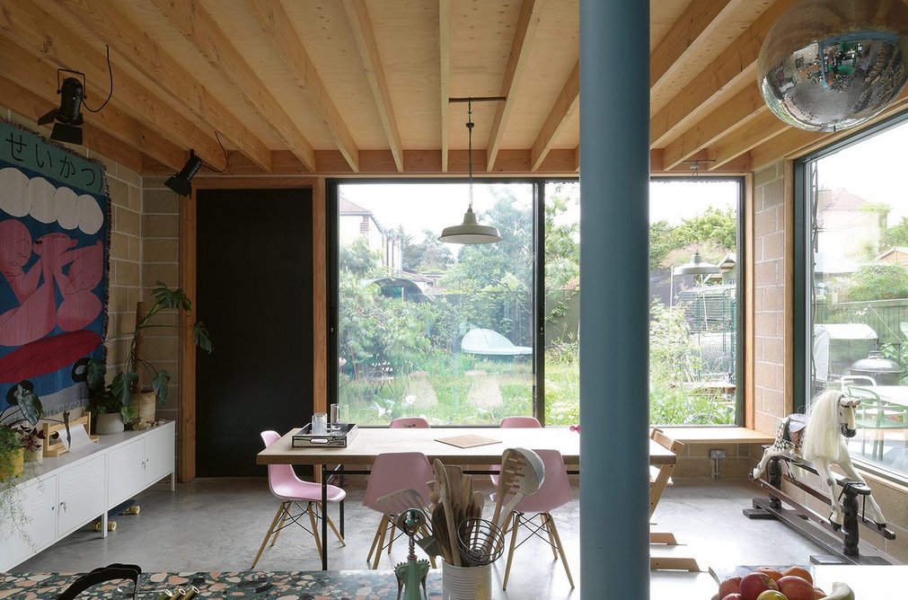 View through the dining area into the garden. The kitchen space has proved ideal for hosting parties.