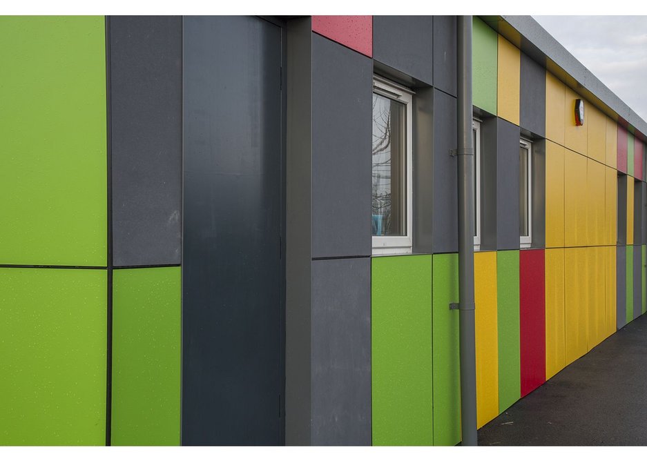 The colourful Formica rainscreen clad exterior of Barrow Hall Primary School near Warrington, designed by Ellis Williams Architects.