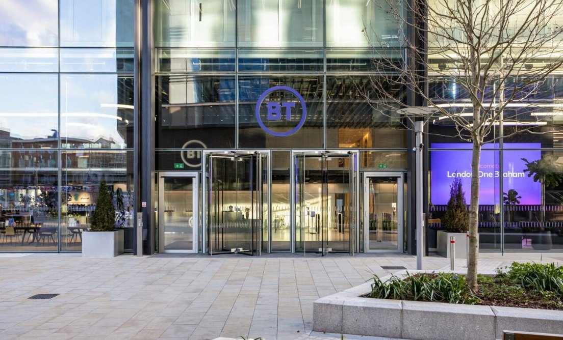 The glass facade entrance to BT at One Braham on Braham Street, Aldgate.