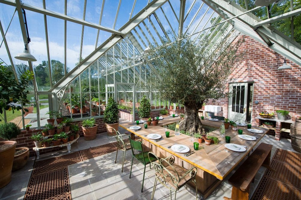 The 20.2x5.16m glasshouse at Lime Wood Hotel and Spa has social spaces alongside a range of accessories to increase successful growing, including cold frames, benching, strawberry boards and shades and automatically controlled ventilation.