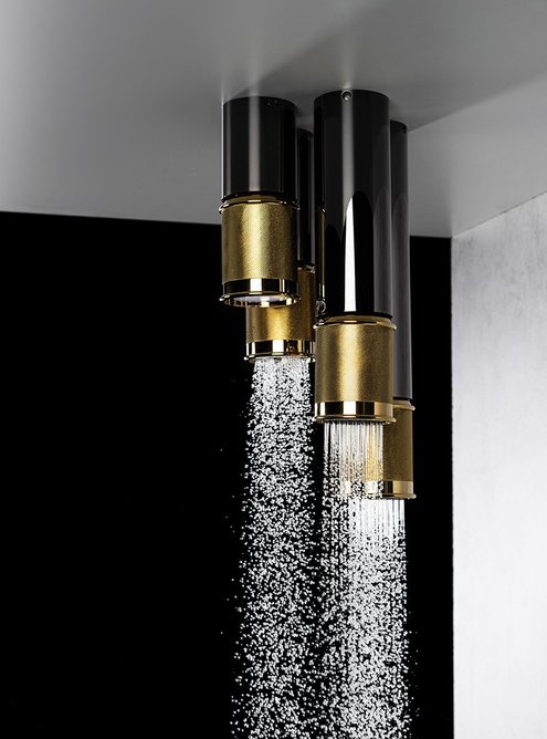 Clusters of Riva Scala ceiling-mounted showerheads and LEDs provide cascades of aerated water and light.