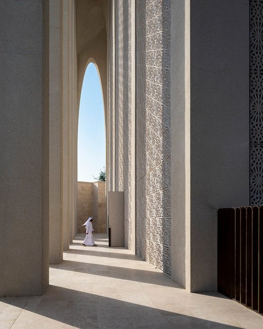 Colonnade surrounding the mosque entrance.