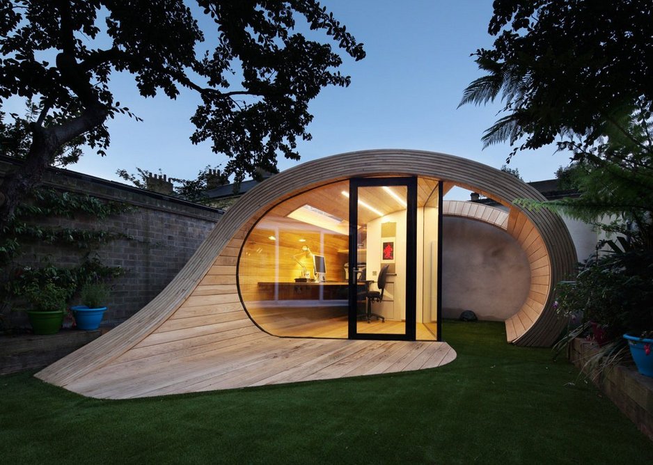 The sculptural form of ‘Shoffice’ enhances the garden.