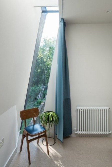 The Glazing Vision Fixed Eaves Rooflight maximises light at Pitched Black House.