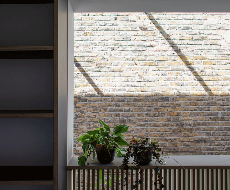 At first floor levels, both the study and bathroom look out onto the double height, rooflit kitchen space.