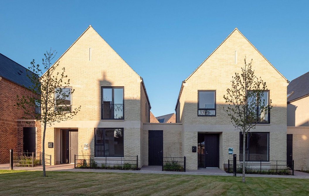 Warm-toned finish: Somerbrook houses with tumbled walling stone in oolite shade.