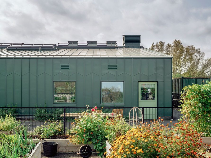 Coloured zinc cladding is intended to blend with the landscape.