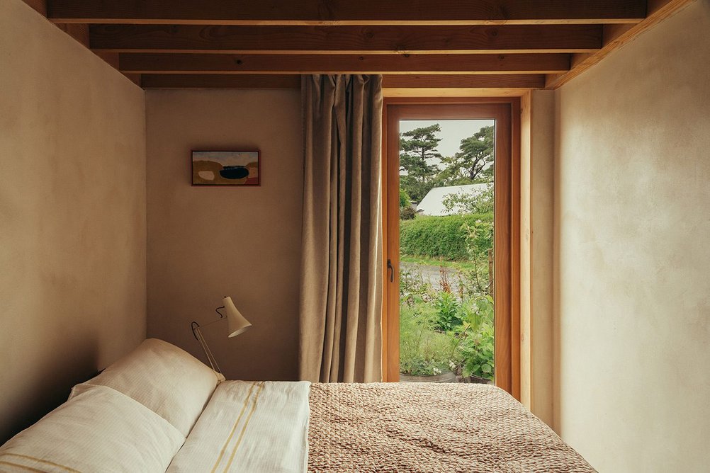 Natural materials create a warm and simple colour palette internally.