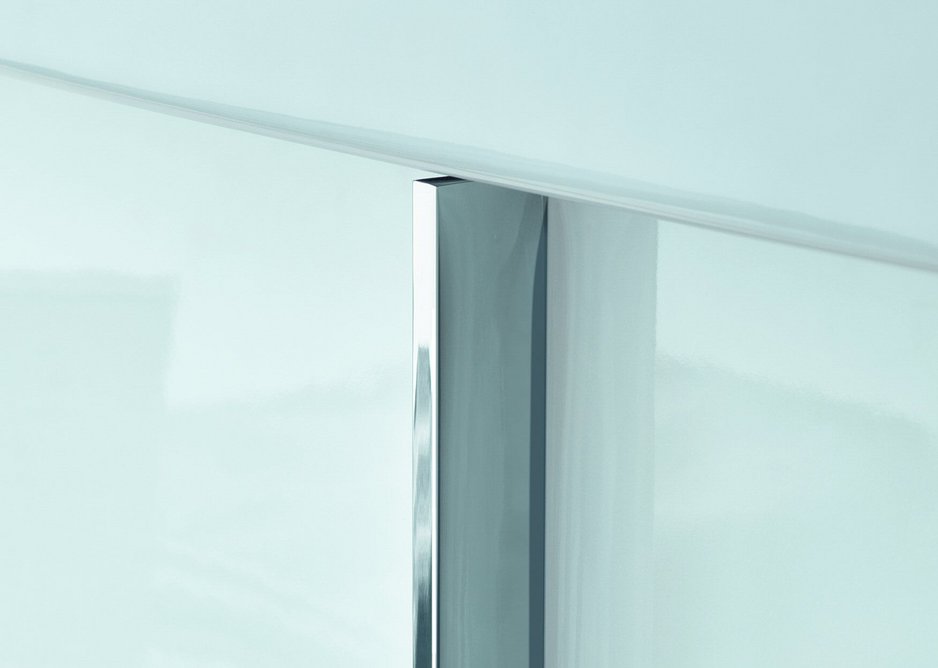 Inset vertical handles create a striking contrast to the classically modern form.