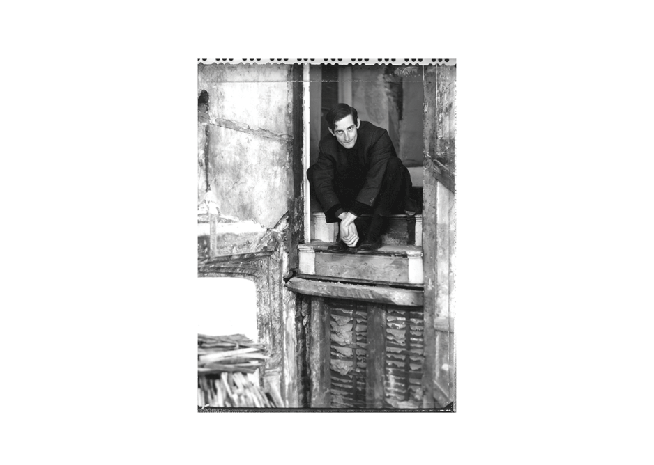 A young Richard Griffiths perches in his breakout project, the then near-derelict Sutton house in Hackney.