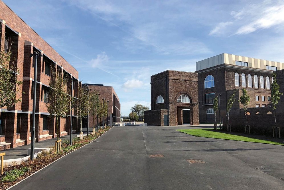 North end of the campus looking east. New humanities and science blocks form the northern border. The old water tower is now a gazebo, with transmitter hall to the south.