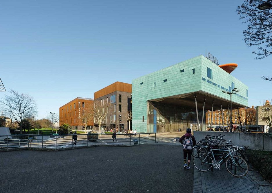 The new 10,000m2 academy nestles in behind will Alsop’s prize-winning Peckham Library.