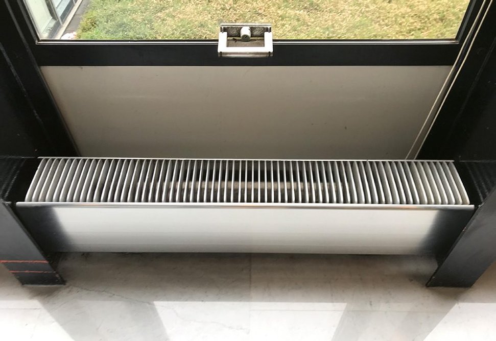 Hiding heating coils, Prouvé even designed click-fit aluminium radiator housings which sit between the ground floor’s exposed steel columns.