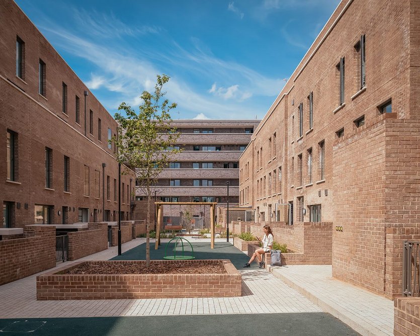 Mae’s blocks frame a narrow courtyard.