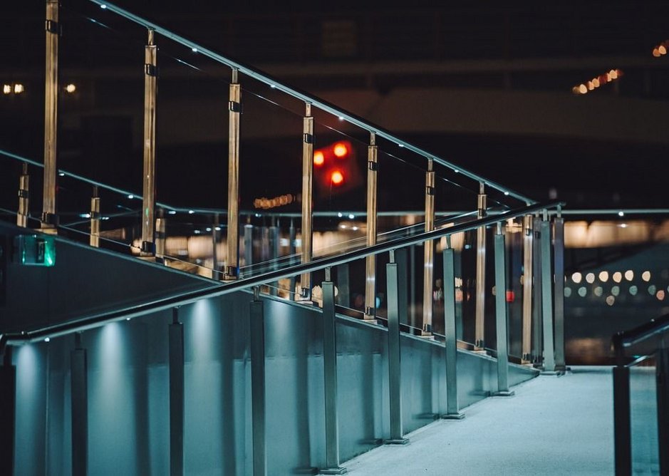 The Square Line 60x30 balustrade lines the ramp, bridge and pontoon at Battersea Power Station Pier.