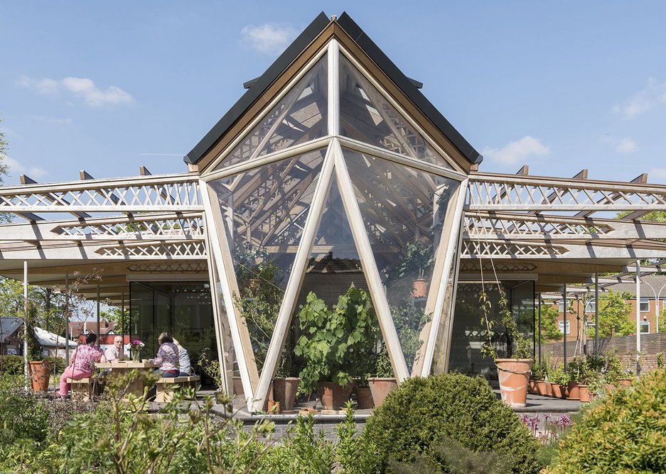 Maggie’s Centre in Manchester, designed by Foster + Partners, includes a greenhouse where people can enjoy the therapeutic benefits of gardening.
