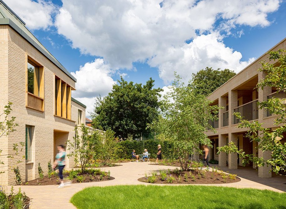 The landscaped garden between the two buildings – a place for respite and children’s play.
