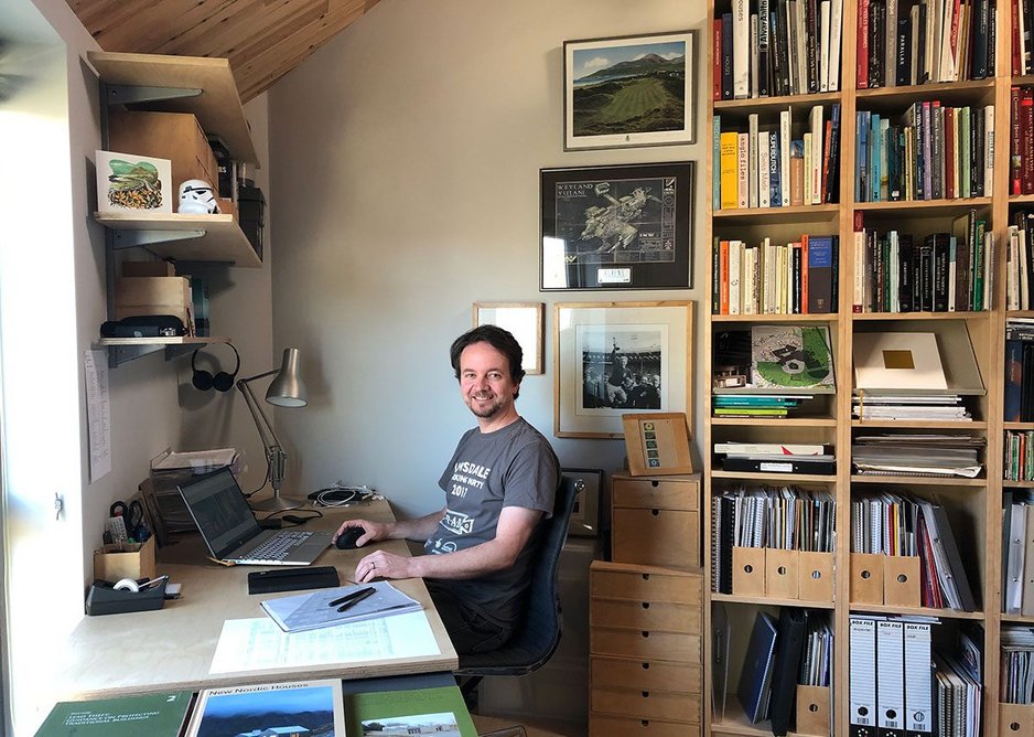 James Boon working in his home office at the award-winning Stackyard – longlisted for RIBA House of the Year.