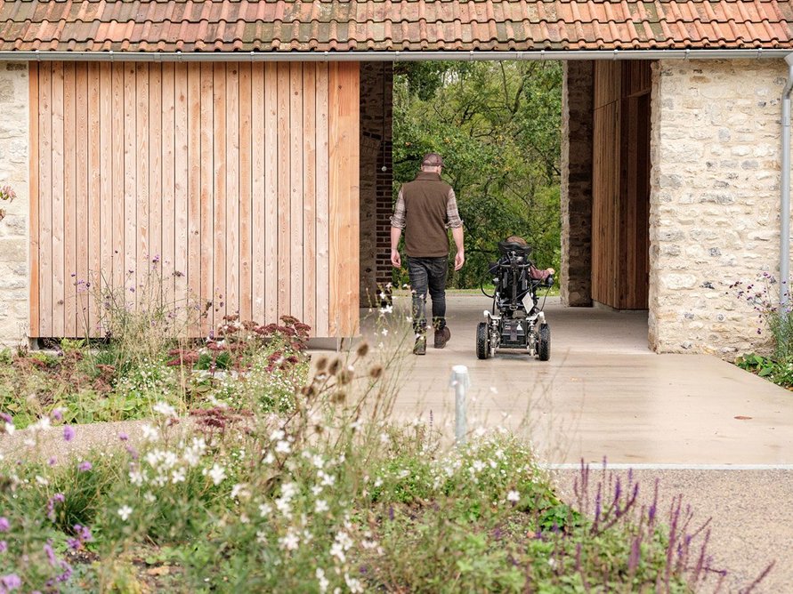 A new opening in the northern range leads to a boardwalk giving access to the wider landscape.