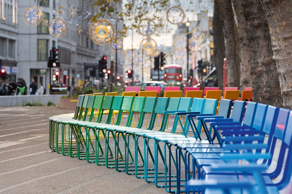 The multicoloured social seat is positioned in front of a flexible events space.