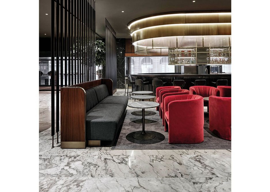 Space Copenhagen's velvet Loafer chairs complement Jacobsen's original furniture in the bar.