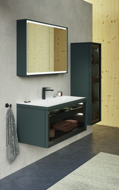 Matching semi-tall and tall cabinets fitted with hinged doors and glass shelves round off the furniture range.