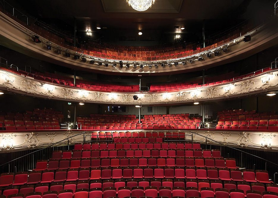 The auditorium with its new graded red upholstery.