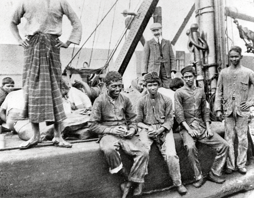 Young Asian men on board a ship, 1908