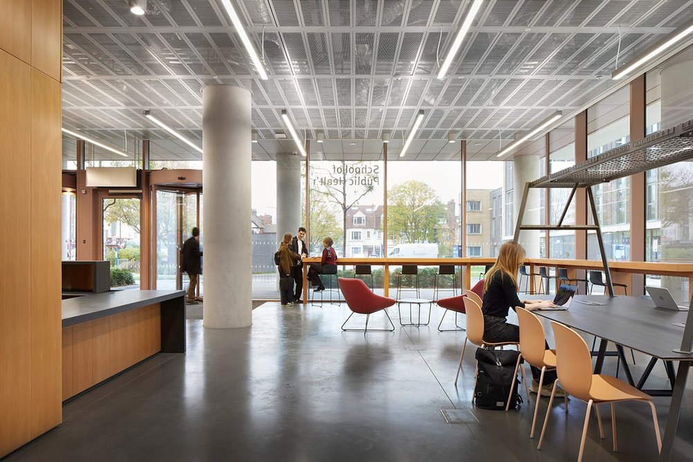 Flexible communal space wraps around the reception desk.