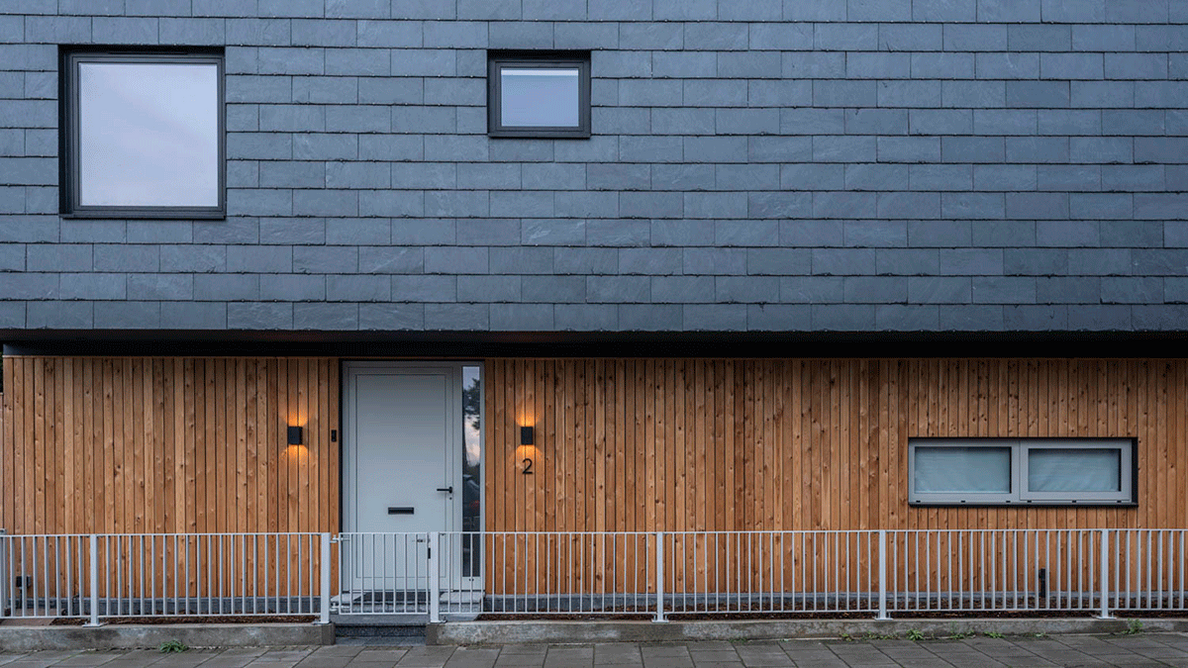 Cupaclad 201: The high-end natural slate has been specified alongside aluminium window framing and refurbished timber fencing.