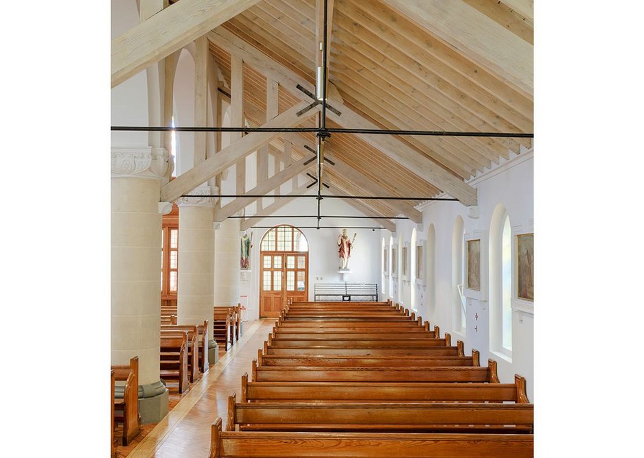 The pale stripped and oiled timbers of the transept.