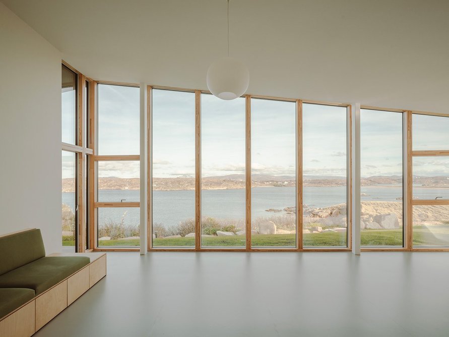 The interior is calm, gallery-like space that does not detract from or compete with the views.