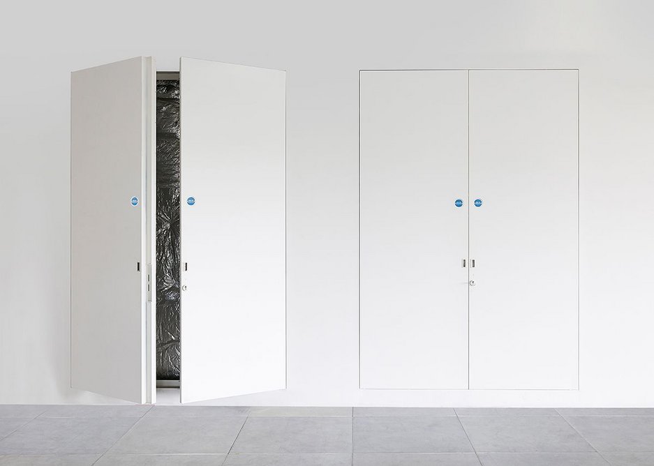 Hide unsightly apartment services using Quadra riser doors · Credit: Selo