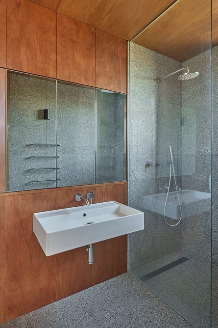 One of the Lauran plywood and terrazzo tile bathrooms at Seosaeng House, South Korea, designed by Studio Weave.