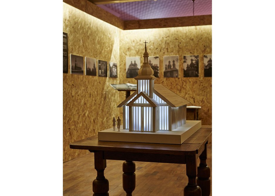 A model of the new church is at the centre of the exhibition, with photographs of Belarus on the surrounding walls.