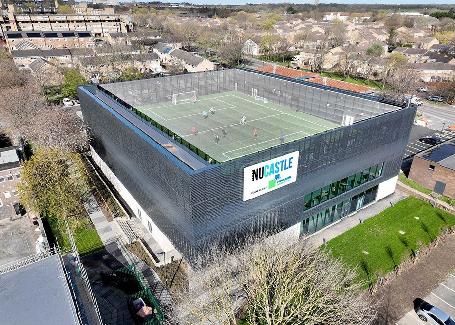 The building, with a mini soccer pitch on the roof, is next to St James’ Park stadium, by the city centre.