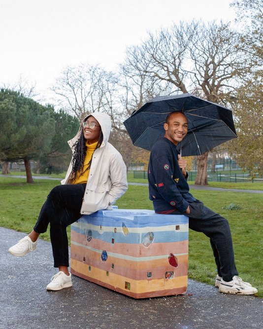 Owoo and collaborate Quincy Harper on their Water, water everywhere bench for the Royal Docks, made of resin  encapsulating the rubbish found in the Thames..