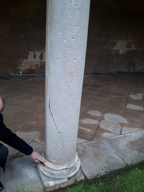 Inspecting the cracking columns of Canterbury Quadrangle, St John’s College, Oxford, at the start of Wright & Wright’s restoration project.