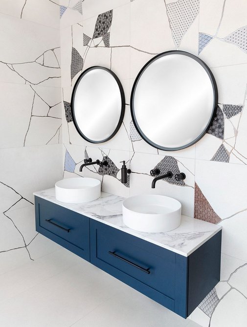 Terrazzo meets matt navy and black. Bagnodesign Revolution furniture, washbasins and mixers with Koy mirrors, Sanipex.