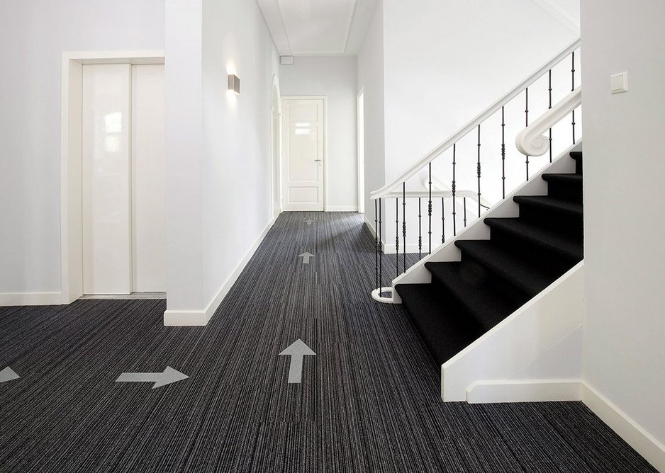 Tessera Outline carpet tiles with arrows: All 40 colours in the range can be used to produce directional tiles.