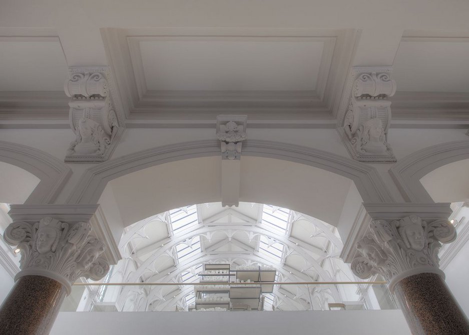 Looking up to the mezzanine and the once-hidden barrel vault.