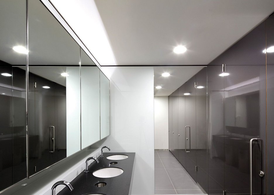 Art Deco themes in the lobbies are reflected in monochrome washroom finishes.