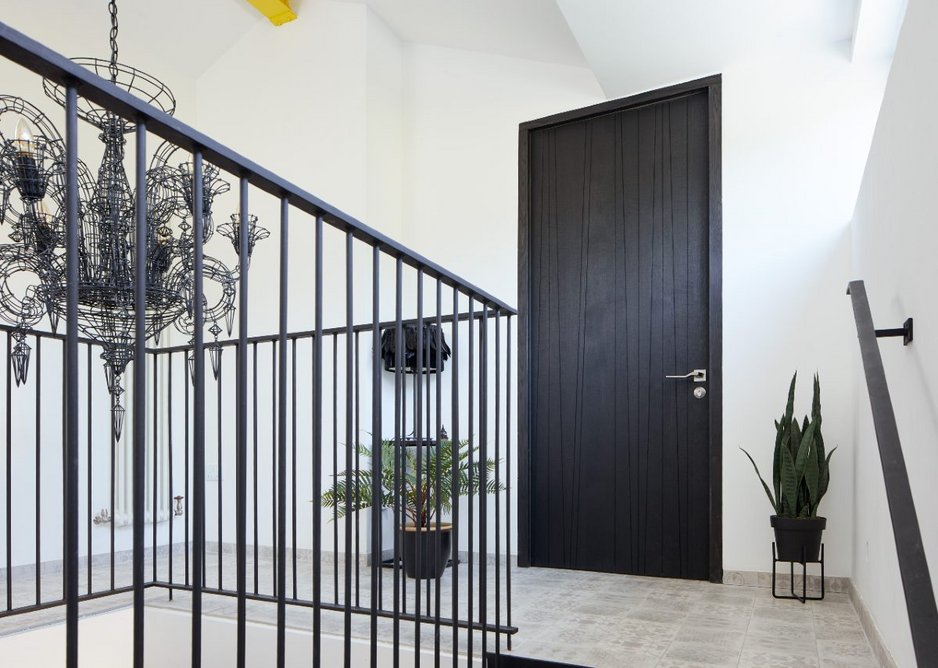 Urban Front Milano V internal doorset in Oak with ebony stain and Option 2 handle.