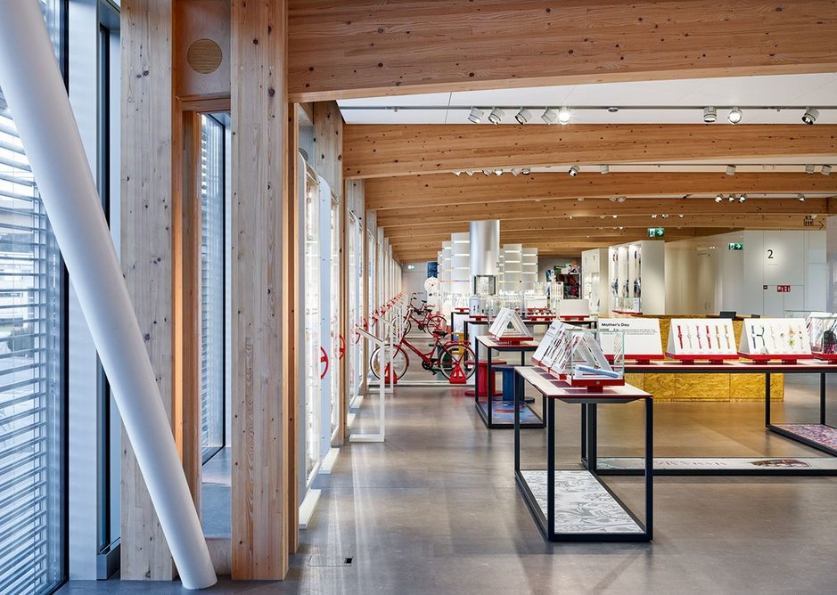 Shigeru Ban covers Swatch headquarters in snaking timber vault