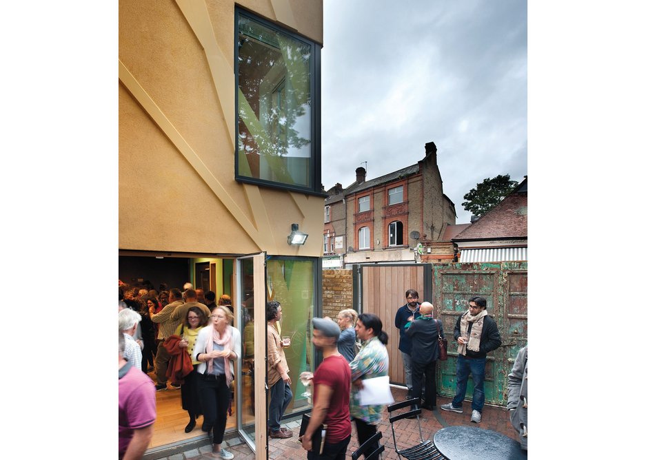 The derelict land adjacent to the theatre has been transformed into an external courtyard connecting to the ground floor box office/foyer bar. British Rail retains access through gates onto the street.