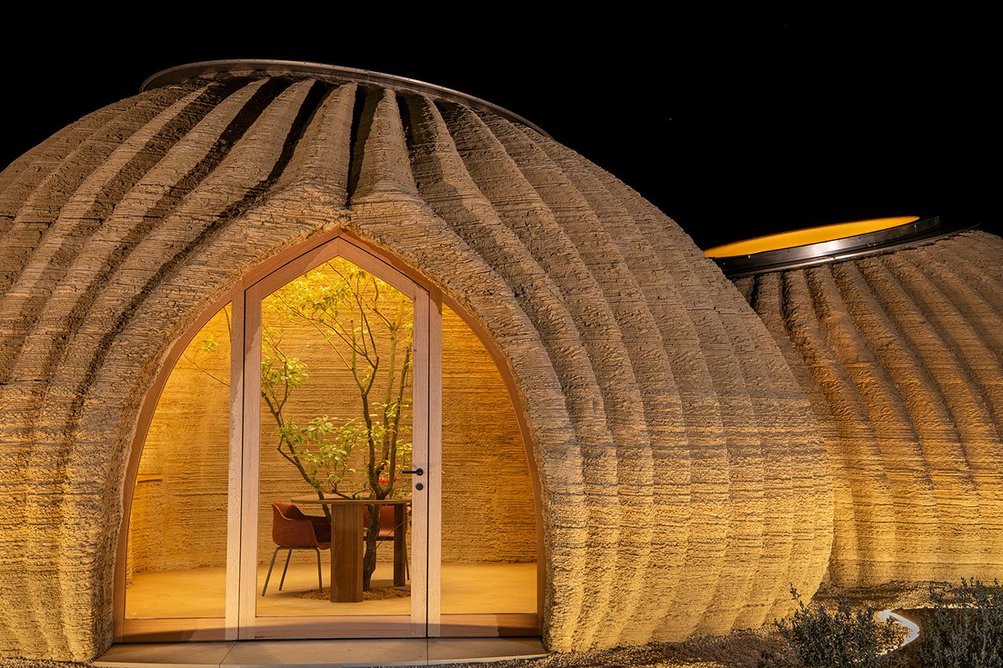 TECLA, a housing prototype 3D printed from raw earth, designed by Mario Cucinella Architects and constructed and engineered by WASP.