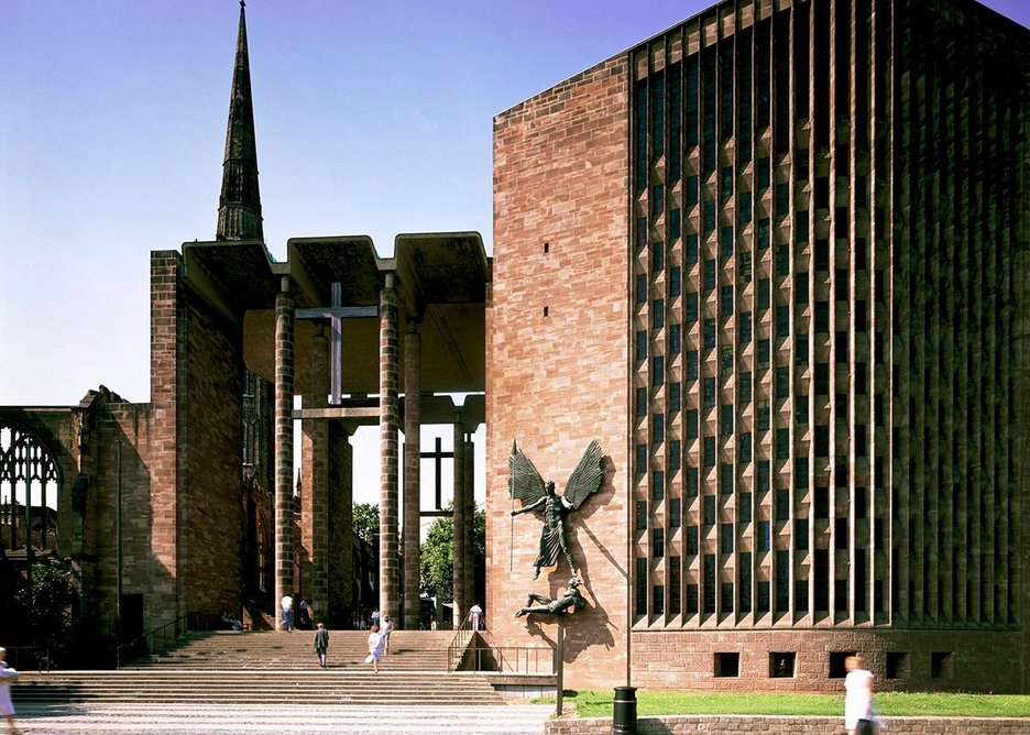 Basil Spence's Coventry Cathedral with the ruined Cathedral of St Michael to the left, serving as a permanent memorial.